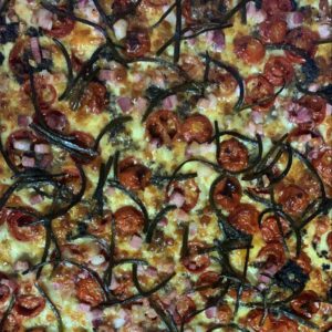 Pizza pomodorini, pancetta, zolle d’aglio e tartufo